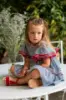 Picture of Foque Girls Gingham Angel Sleeve Ruffle Dress - Navy Red