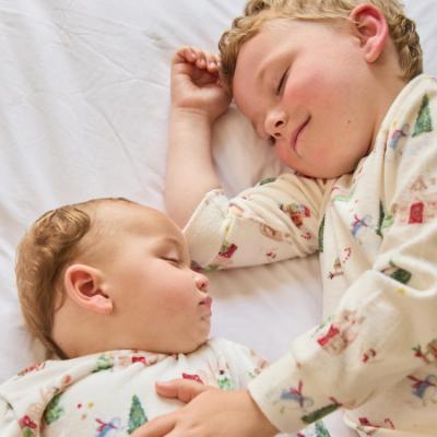 Picture of Caramelo Kids Baby Boys Winter AOP Christmas Sleepsuit - Ivory Red