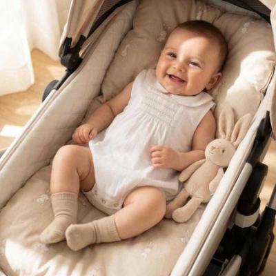 Picture of Deolinda Baby Comporta Smocked Romper - Ivory Beige