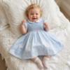 Picture of Sarah Louise Girls Smocked Bodice Puff Sleeve Dress - Pale Blue
