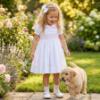 Picture of Sarah Louise Girls Smocked Bodice Puff Sleeve Dress - White Pink