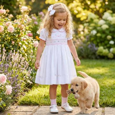 Picture of Sarah Louise Girls Smocked Bodice Puff Sleeve Dress - White Pink