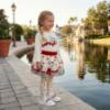 Picture of PRE ORDER Monnalisa Bebe Girls Dalmatian Bow Top & Skirt Set X 2 - Ivory Red