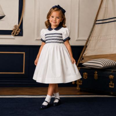 Picture of Sarah Louise Girls Smocked Bodice Puff Sleeve Dress - White Navy