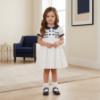 Picture of Sarah Louise Girls Smocked Bodice Puff Sleeve Button Dress - White Navy