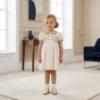 Picture of Sarah Louise Girls Smocked Bodice Puff Sleeve Button Dress - Cream Beige