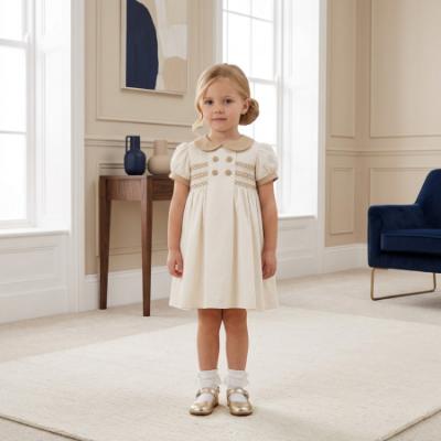 Picture of Sarah Louise Girls Smocked Bodice Puff Sleeve Button Dress - Cream Beige